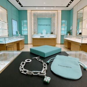 Tiffany & Co. Silver Bracelet with Green and White Charm